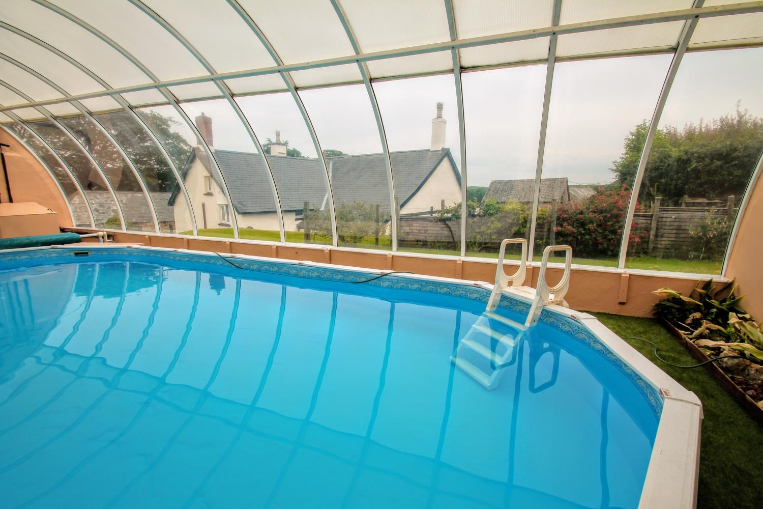 covered outdoor swimming pool upcott farm holiday cottage