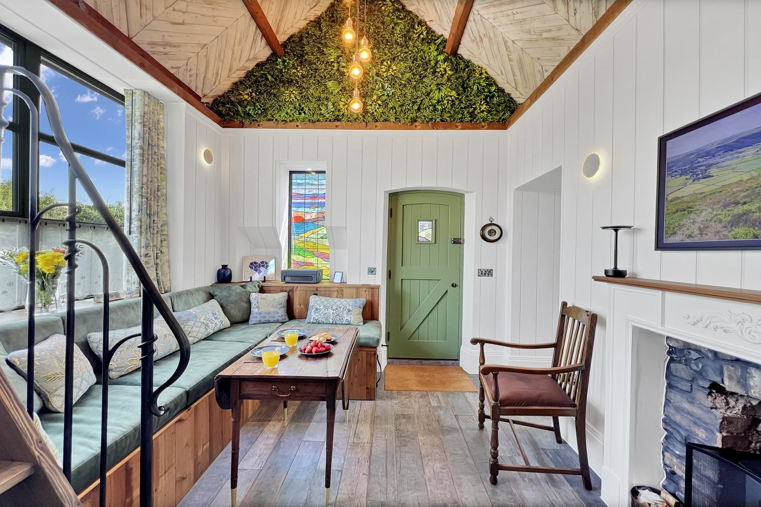 The living room and front door