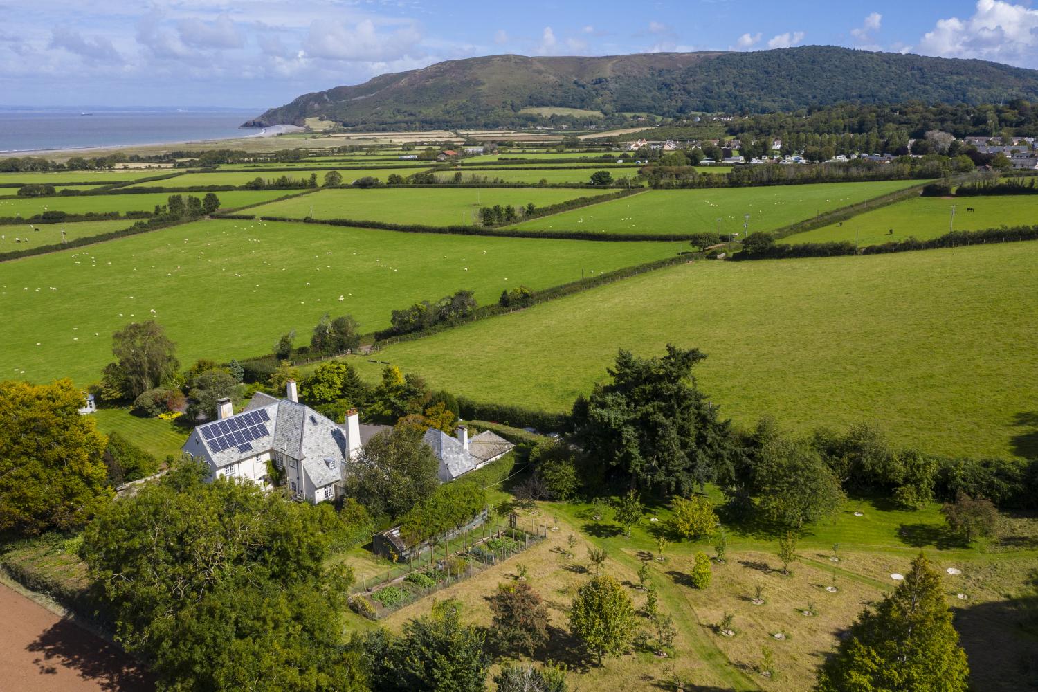 the detached cottage is on the right