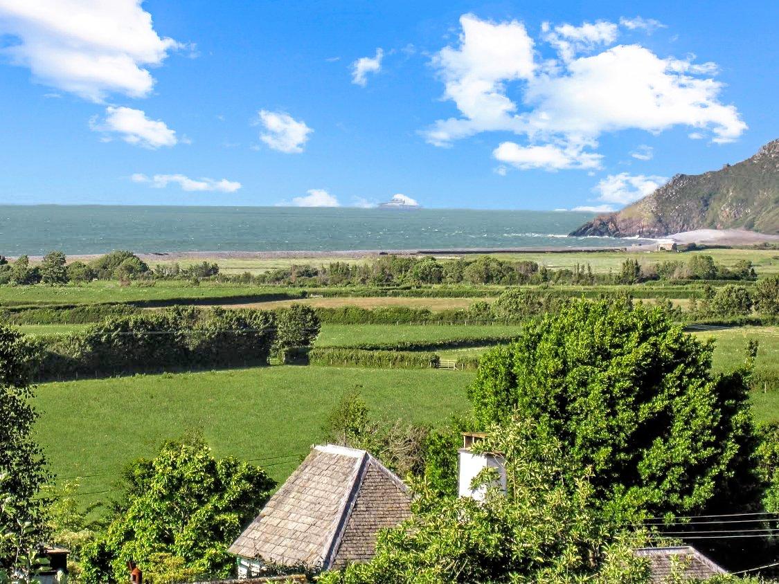 cottage roof with the fields beyond