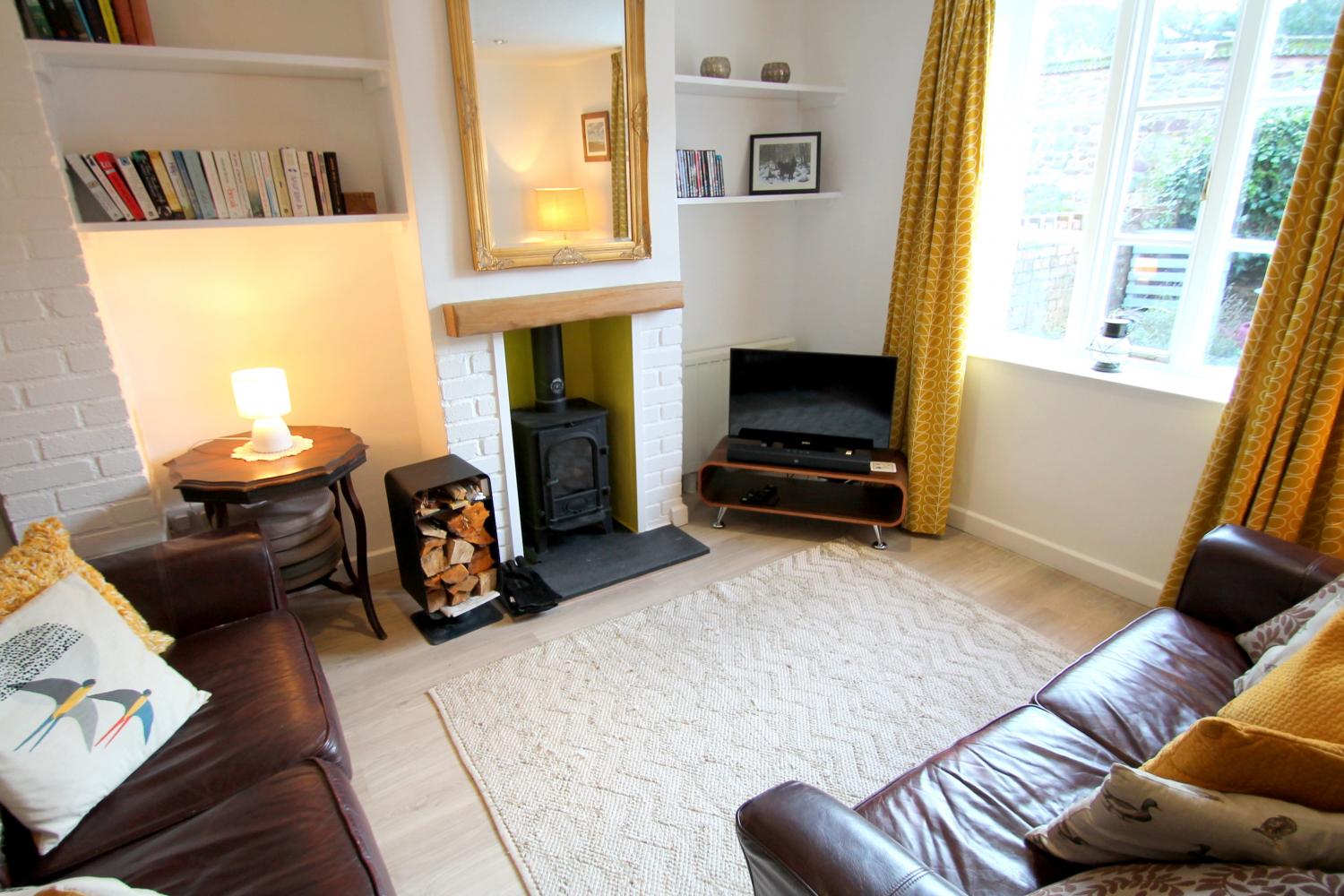 Grace Cottage sitting room with wood-burner