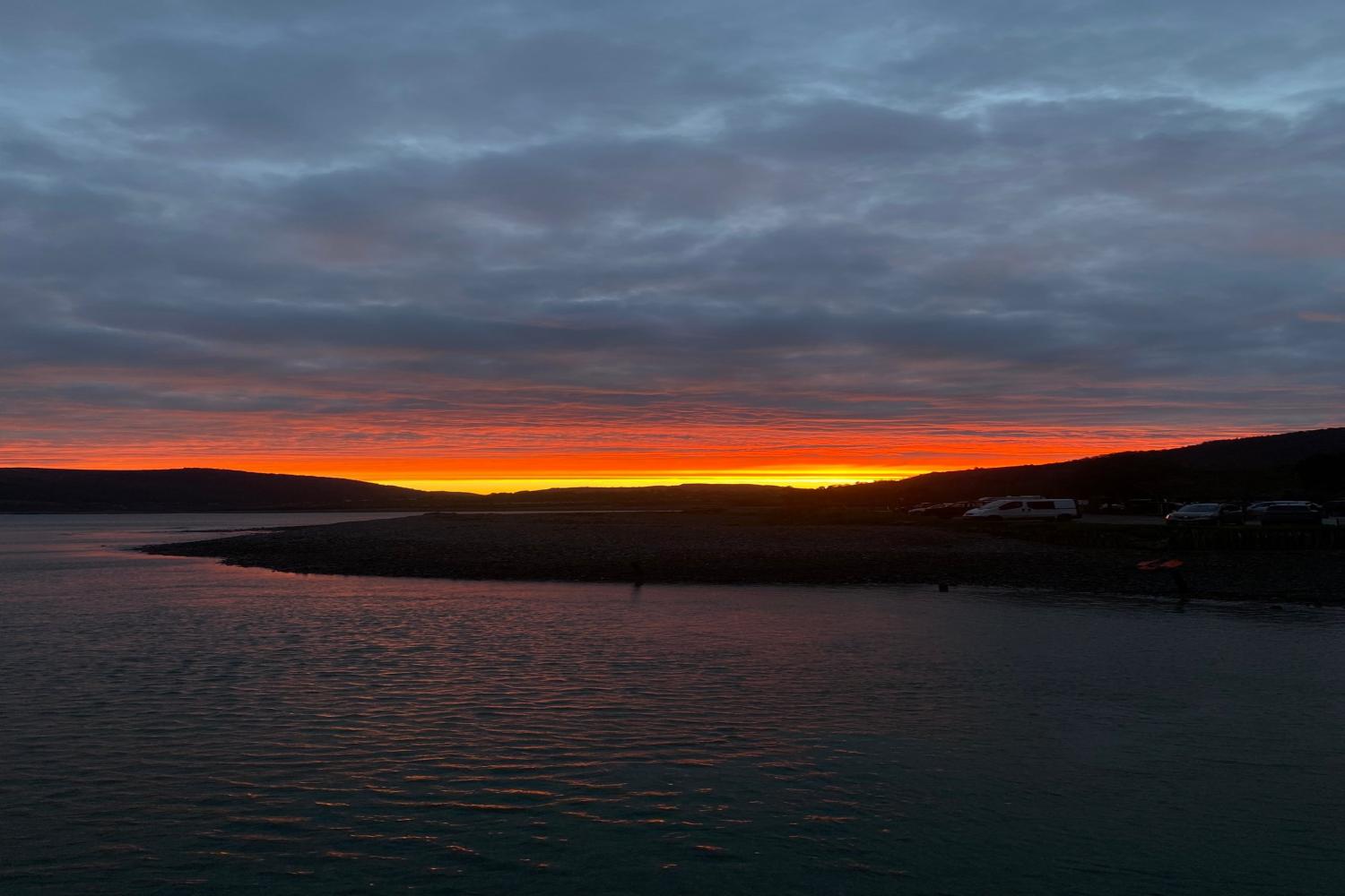 Early risers catch sunrise at Harbour House Apartment Porlock Weir.