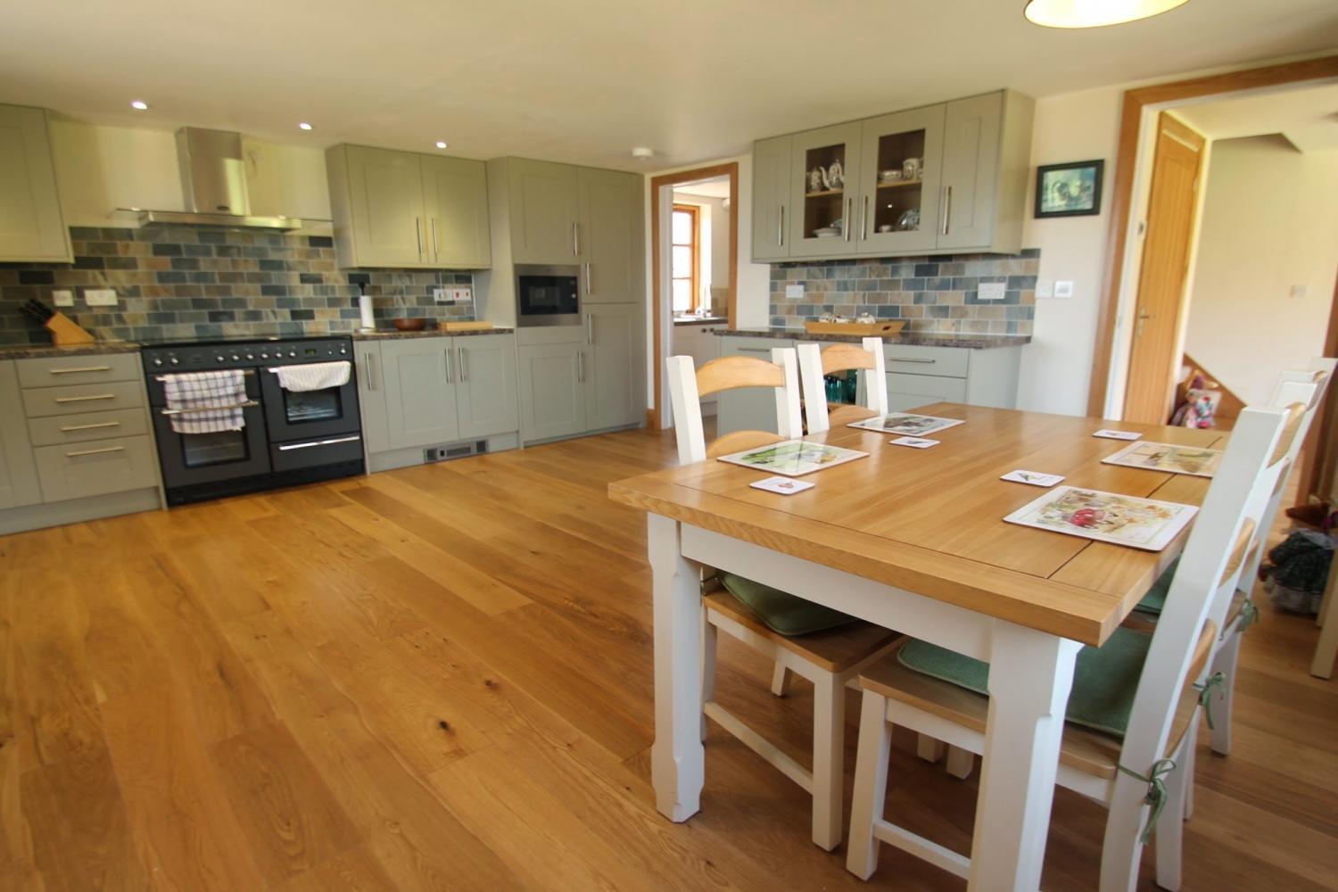 Spacious kitchen with large dining table