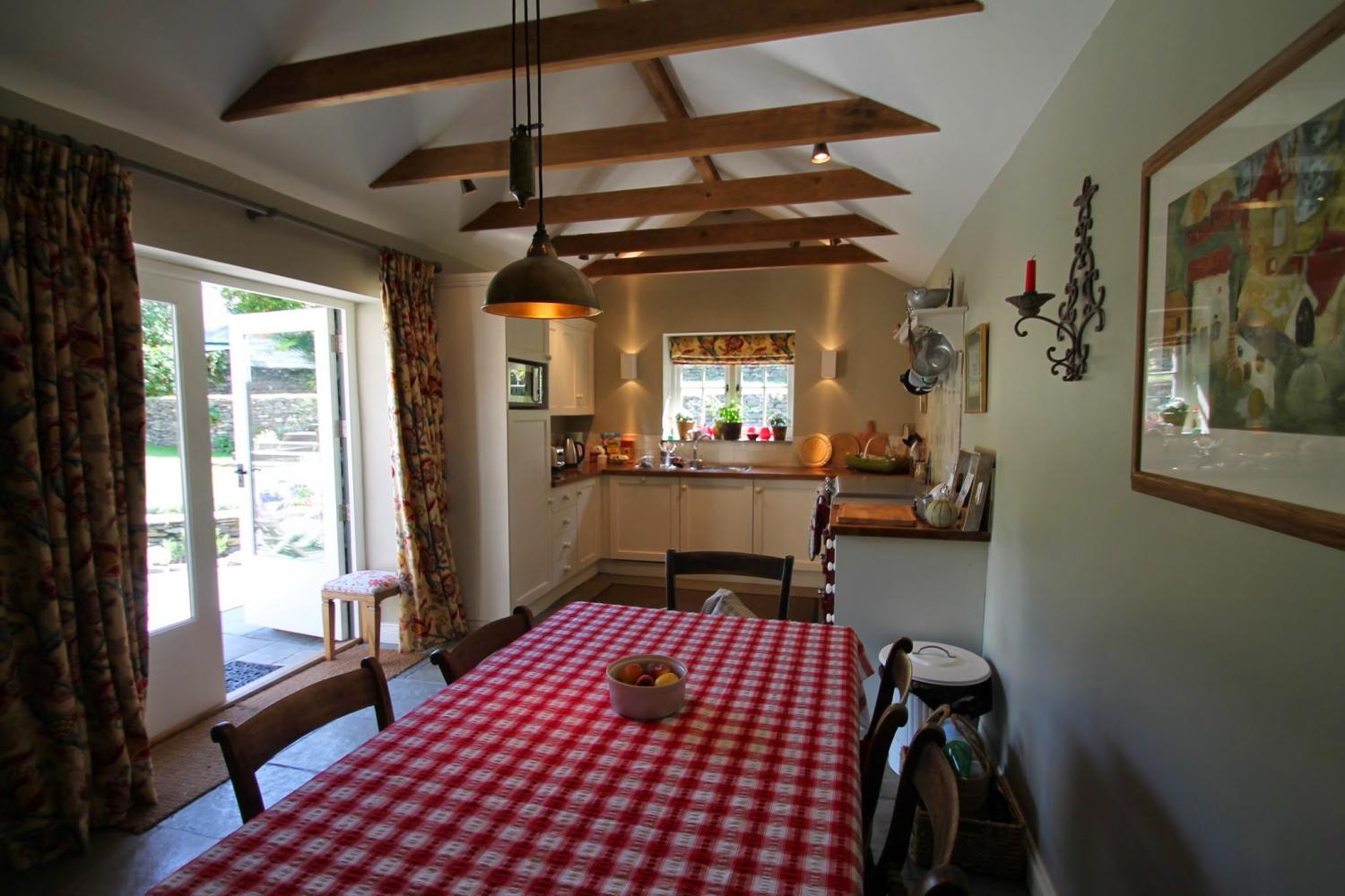 Poocks Cottage Dining Area with adjacent 
 Kitchen
