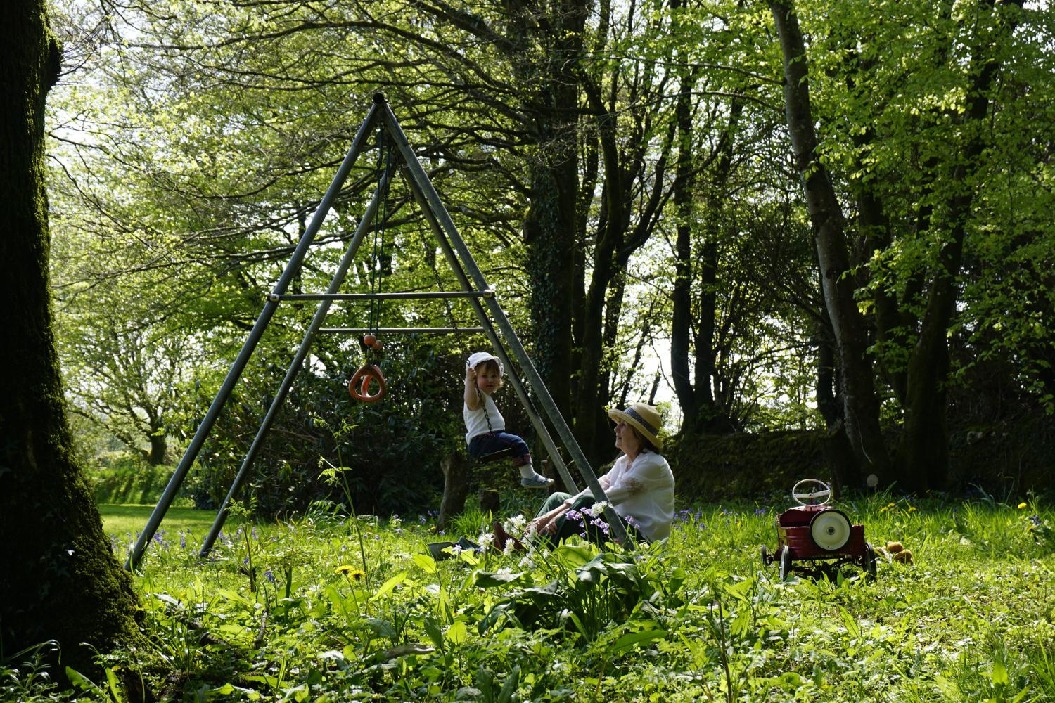 Swings and play in the garden woodland