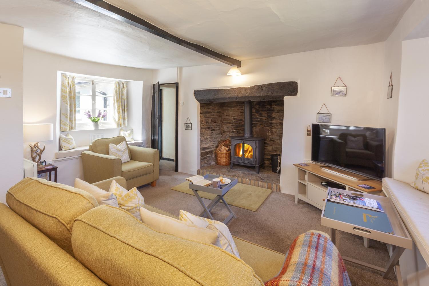 Cosy sitting room in Syms Cottage