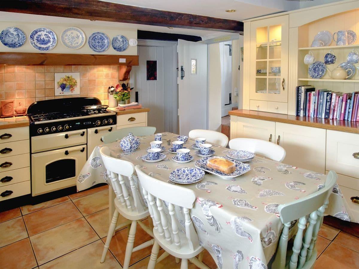 The pretty country kitchen complete with range cooker