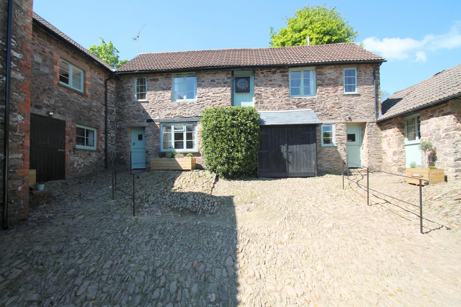 Stable Cottage (left) and Grooms Cottage