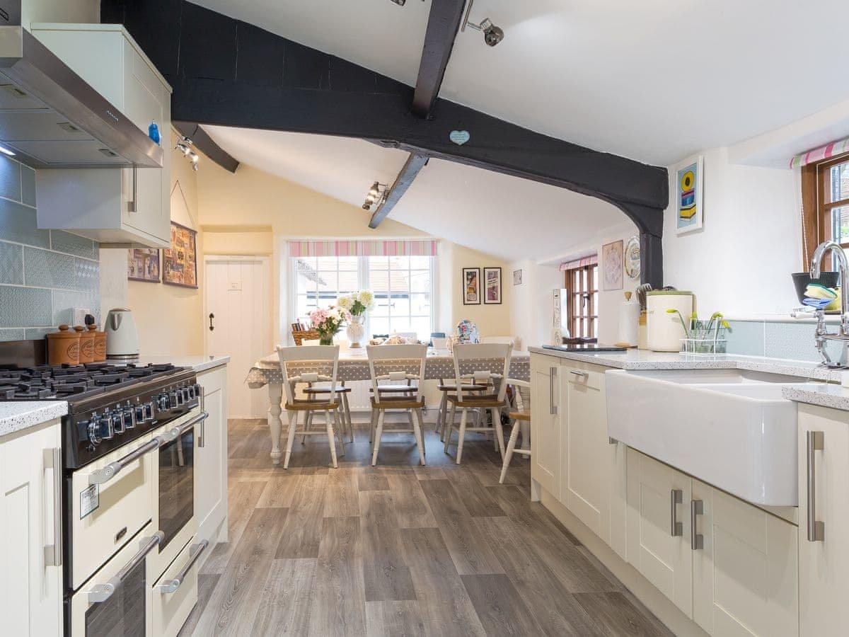 The kitchen/dining room offers plenty of space for budding chefs!