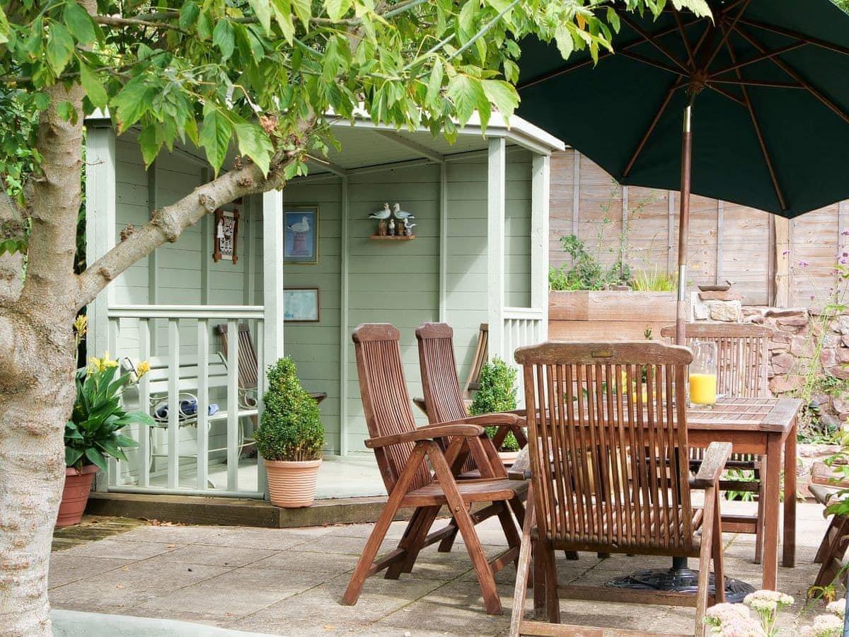 The top terrace also has a summer house.