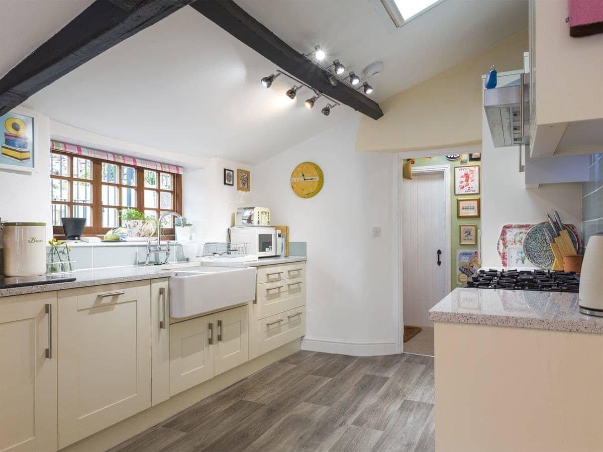 The washing machine, dryer and fridge freezer are in the Utility Room.