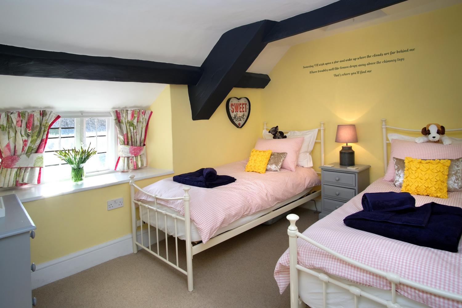 Lemon Drop is our twin en-suite bedroom with comfy Hypnos mattresses.