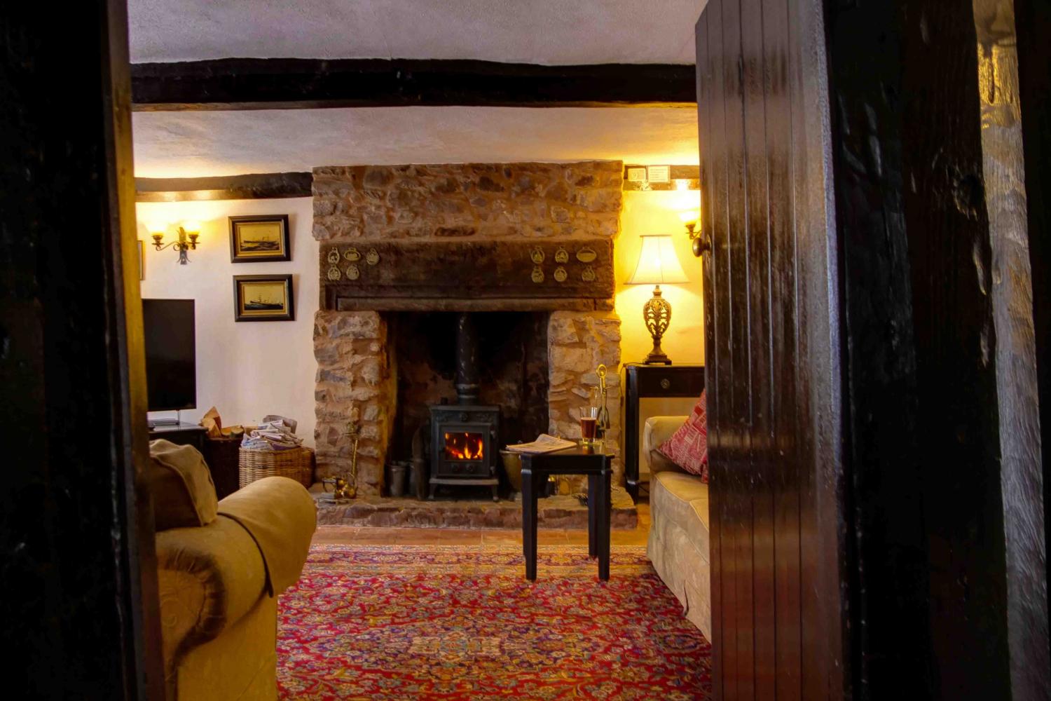 Cosy front room with wood-burning stove