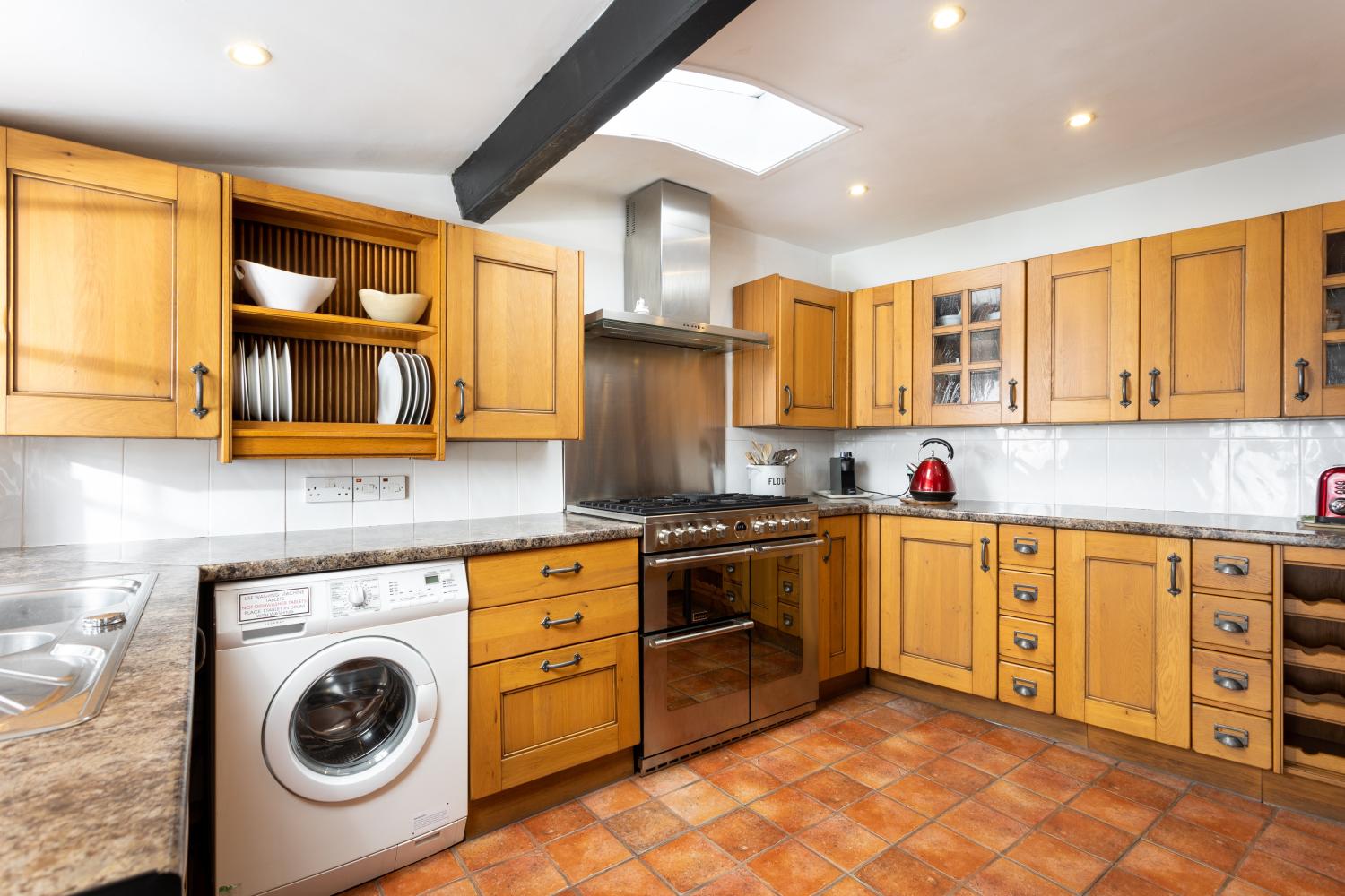 The well-equipped kitchen has plenty of prep space for chefs!