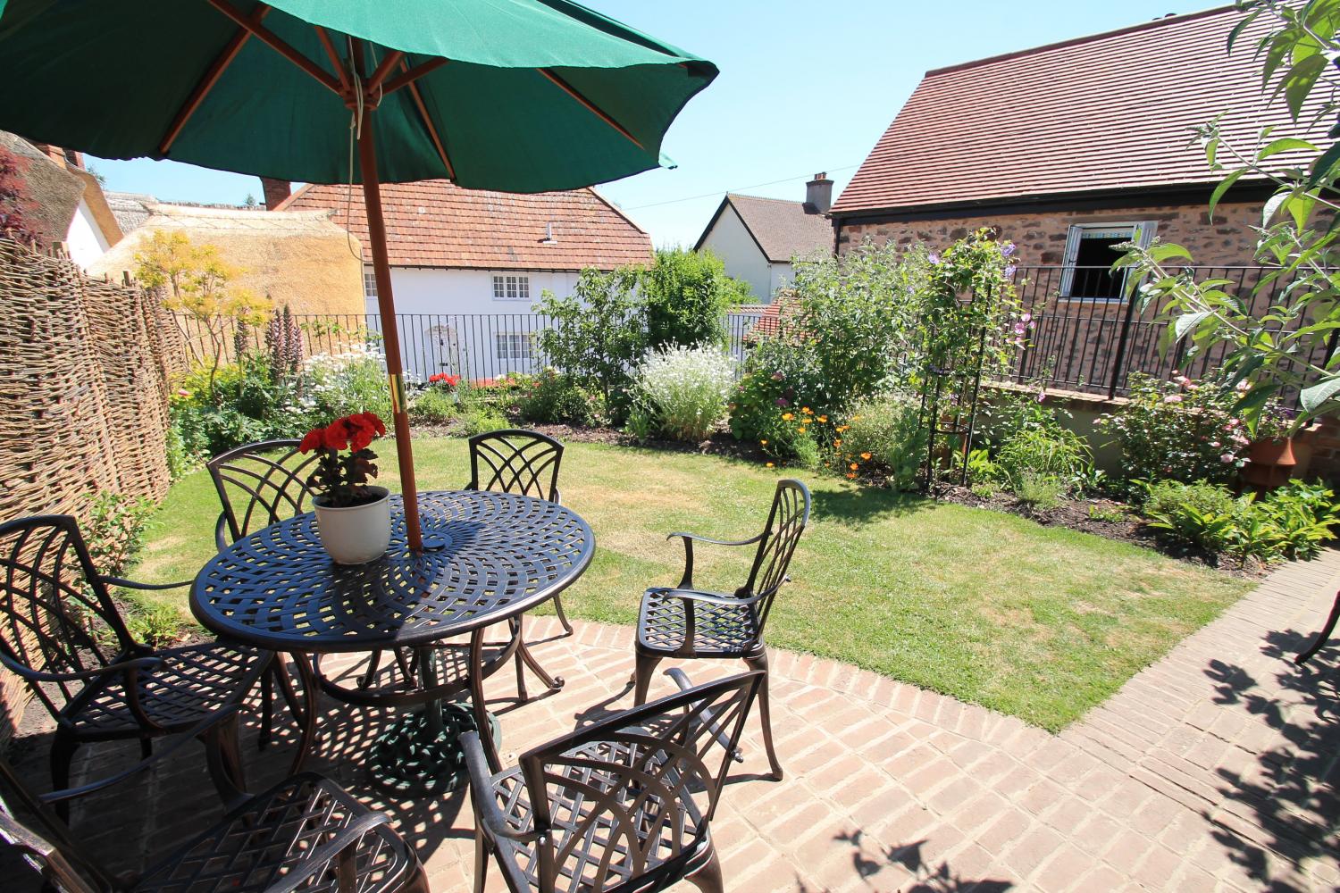 The garden is the perfect spot for a morning coffee or afternoon tipple.