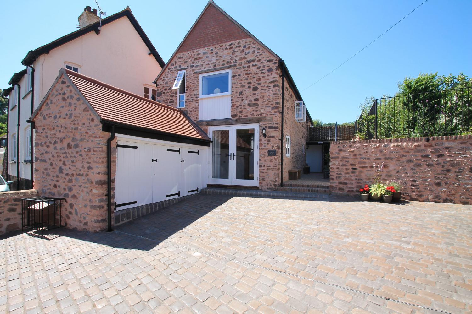 Stone Barn is an architect designed conversion in Higher Town in Minehead, a quiet and pretty conservation area.