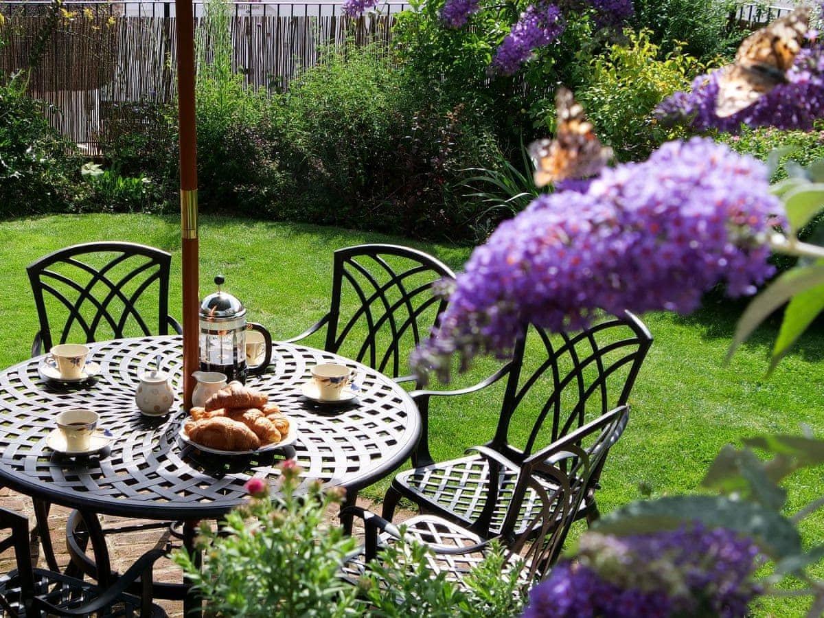 Pretty, secluded and enclosed cottage gardem.