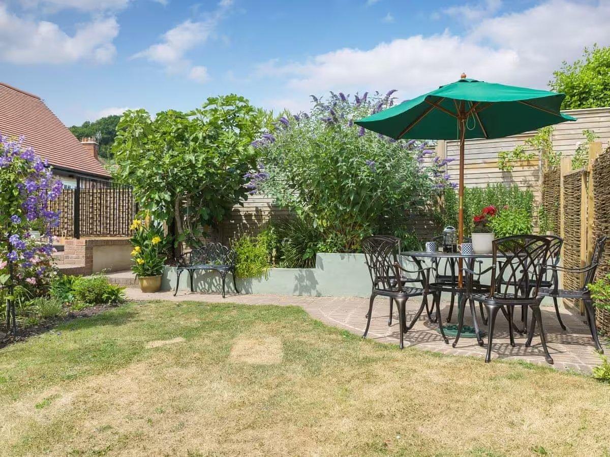 There's garden furniture for al fresco dining.