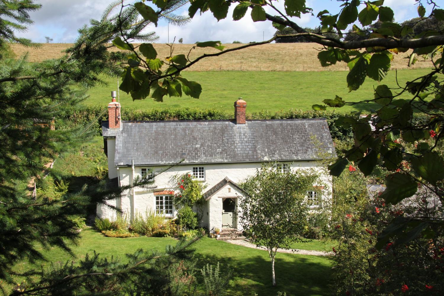 Cottage surrounded by beautiful countryside