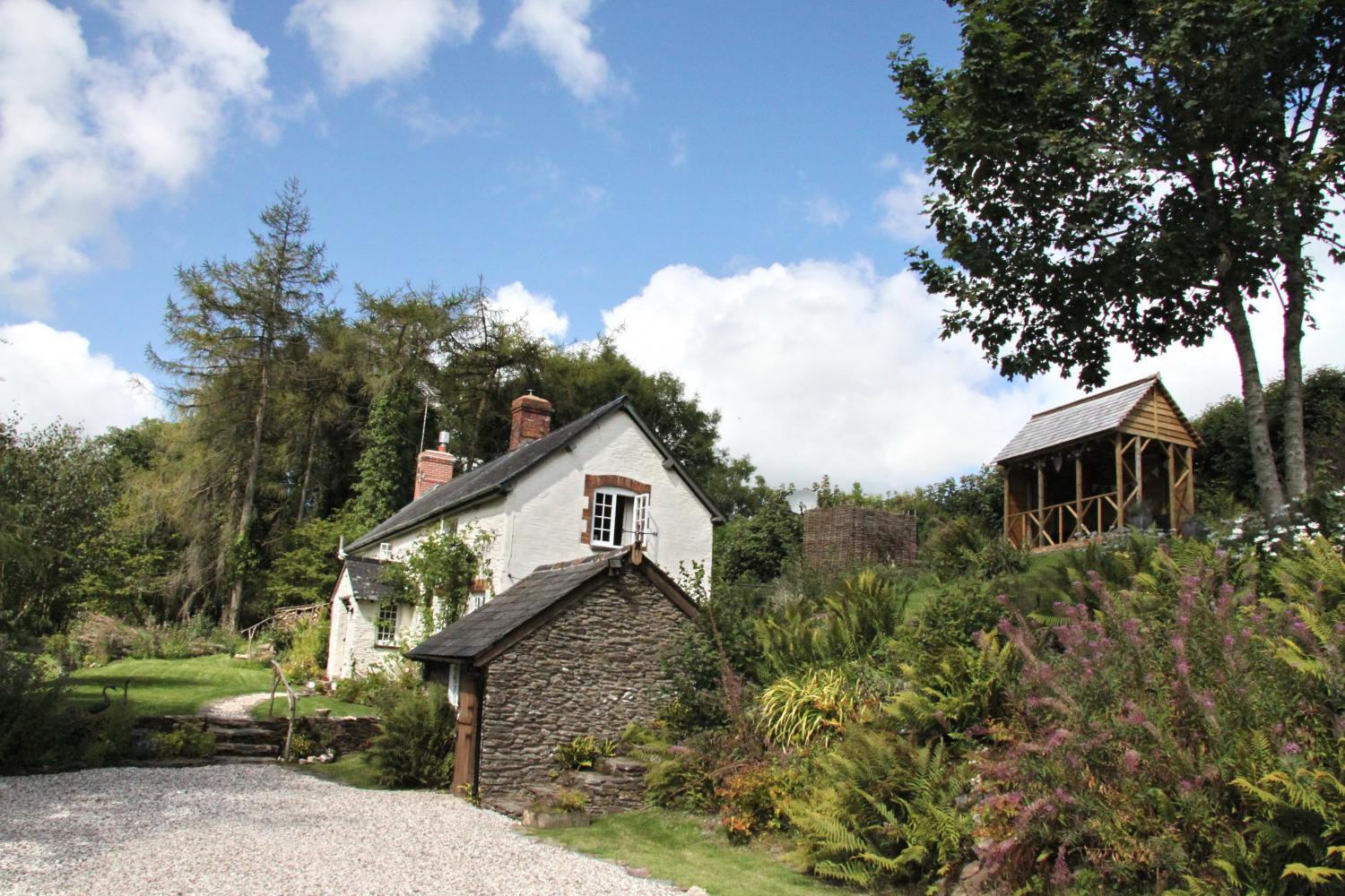 Summerhouse for relaxing and enjoying the silence with a cup of tea or glass of wine !!