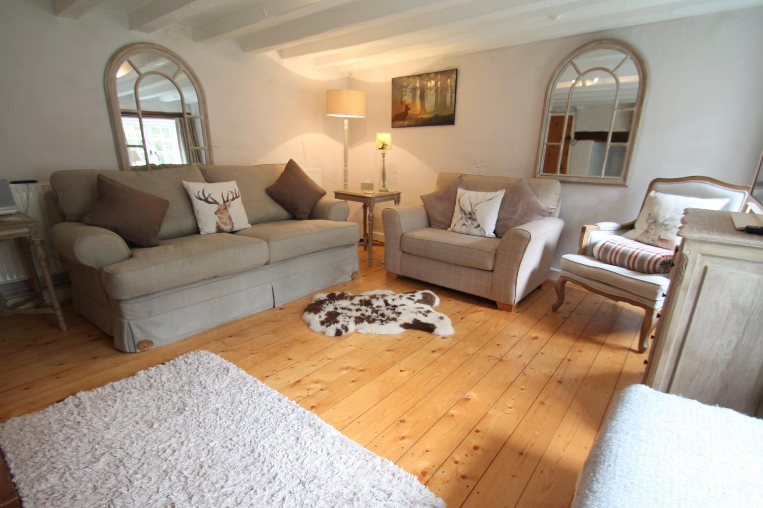 Comfortable seating in the cosy sitting room