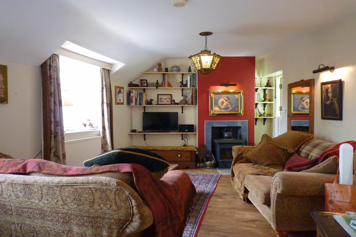 Sumptuous couches. Reclaimed Oak flooring.