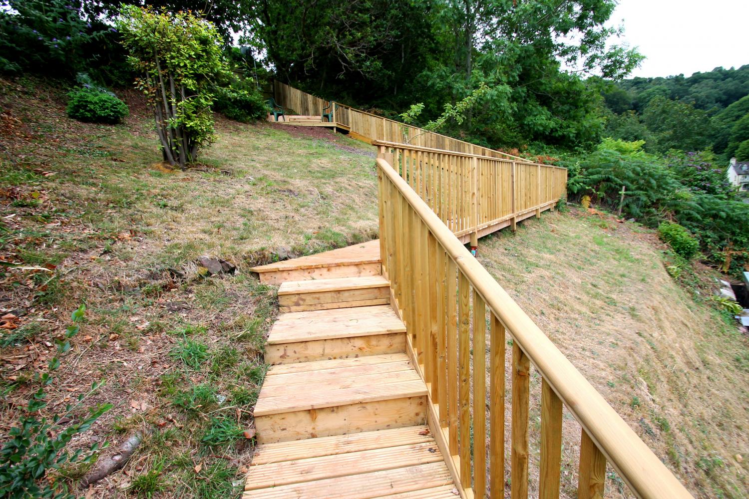 Steps leading to seating area at the top of the garden