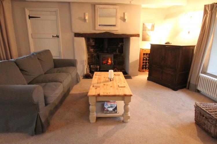 The Mill House sitting room with wood-burner