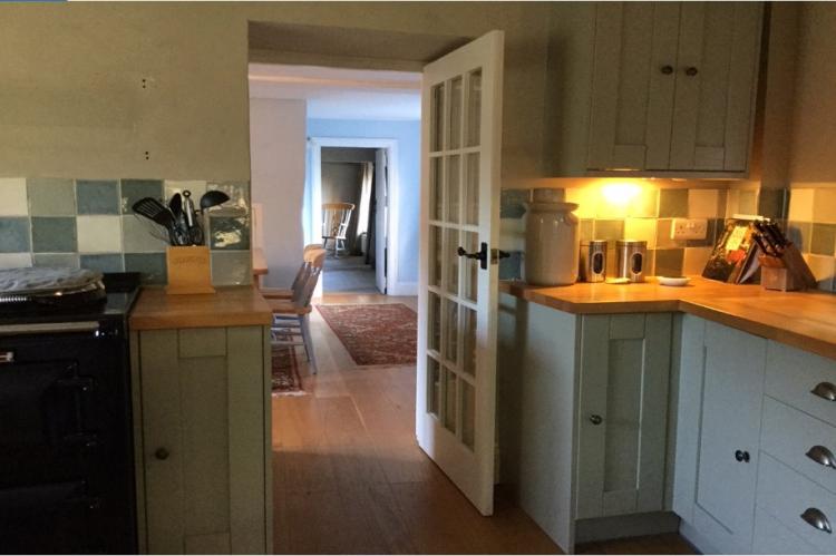 Looking from the Kitchen through Dining room to Sitting room