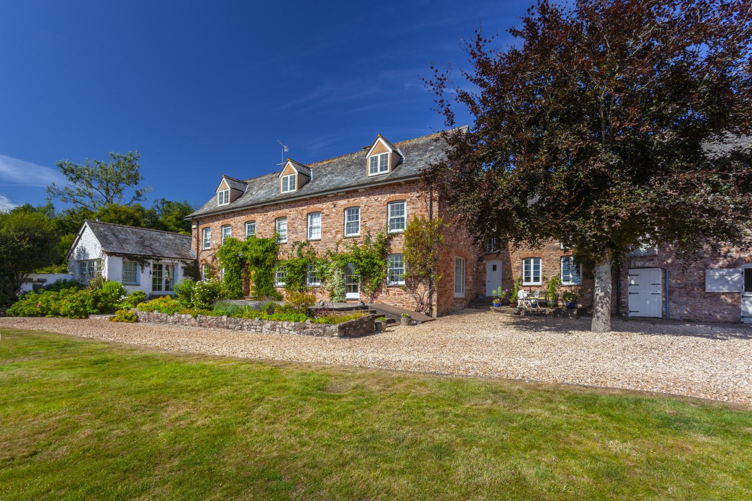 The cottage is to the right of the main house