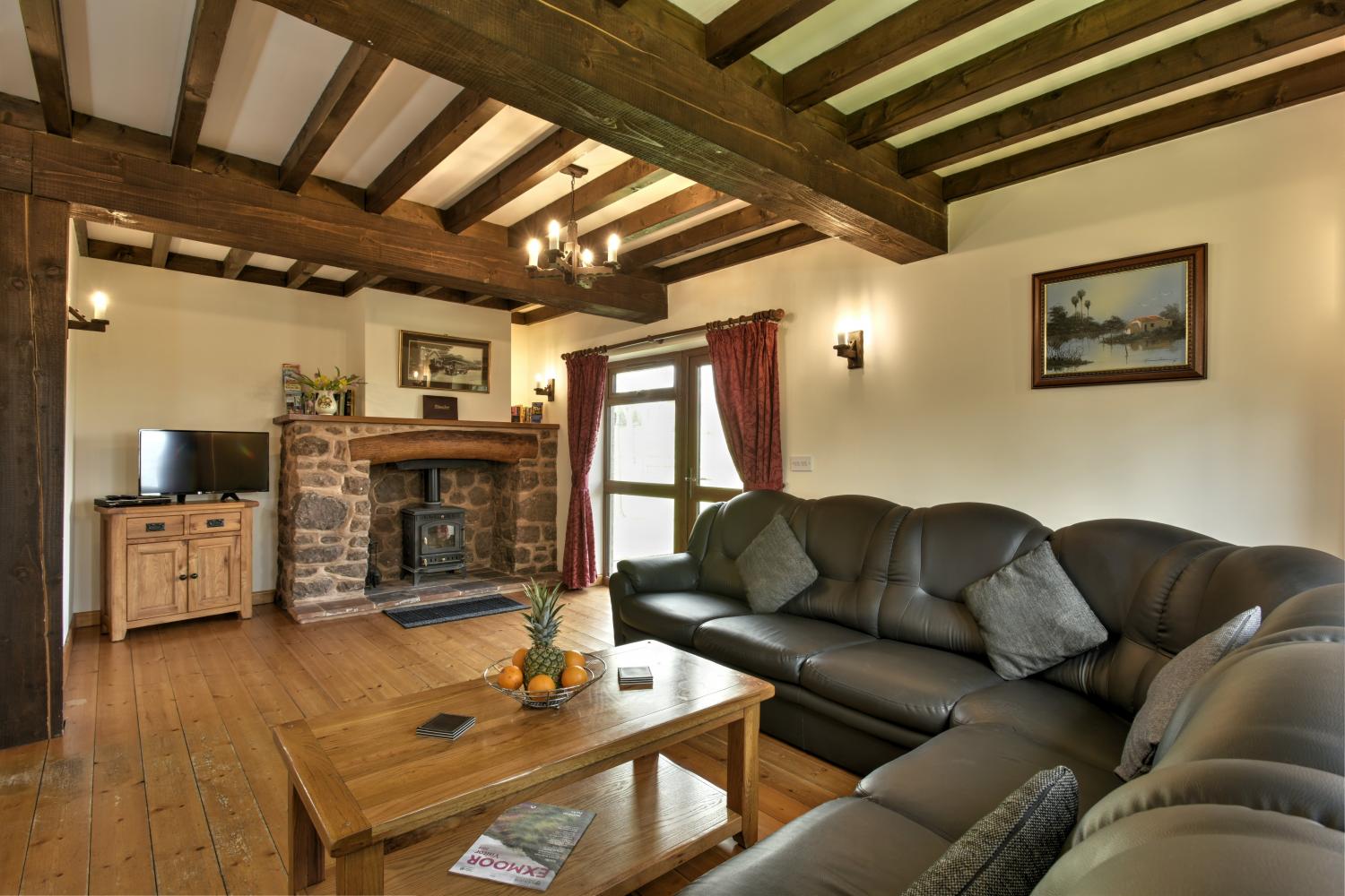 Lovely wood-burner in the lounge area