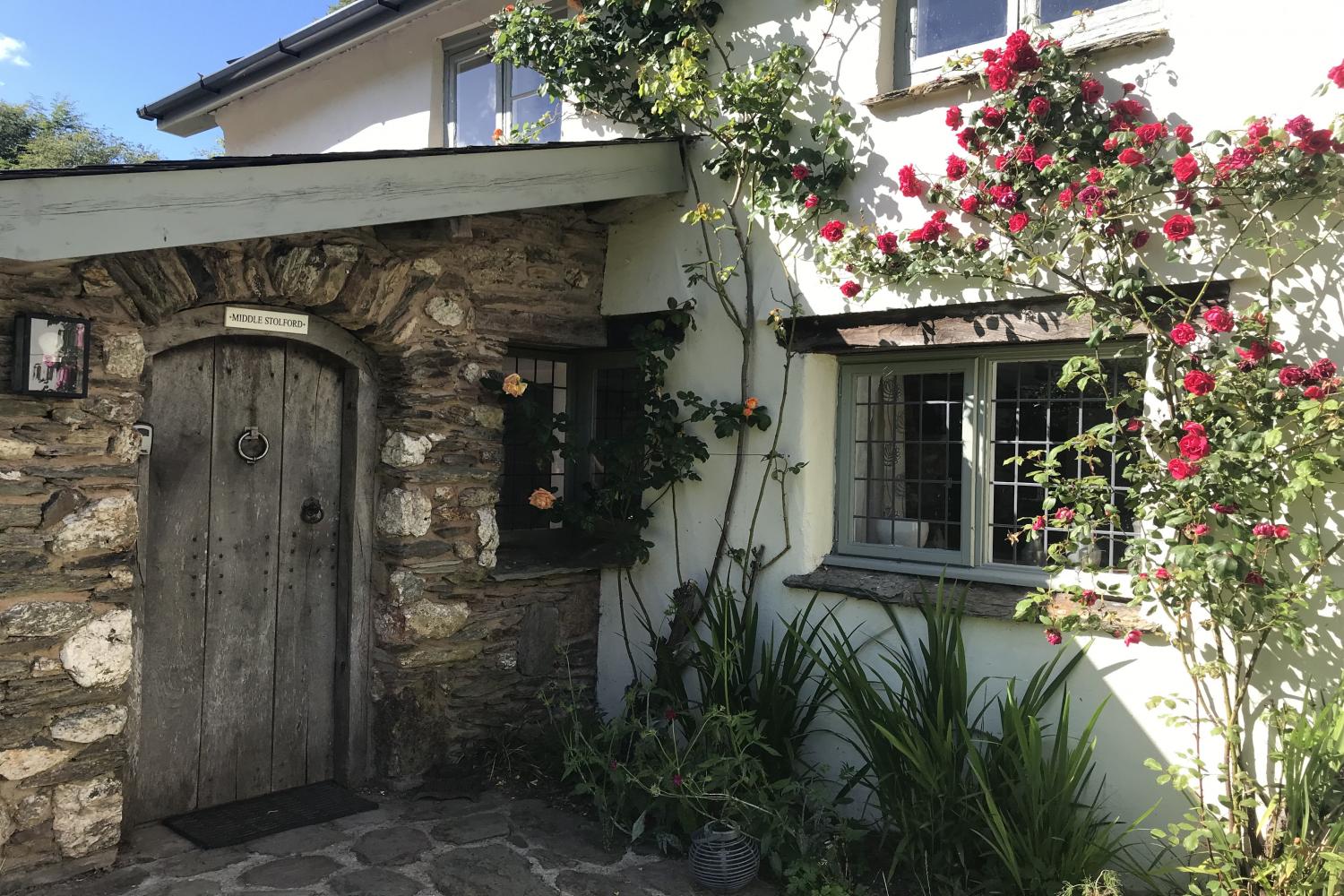 Middle Stolford cottage with roses around door