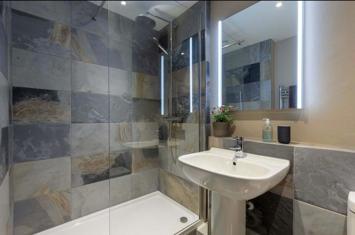 The ground floor walk-in shower room