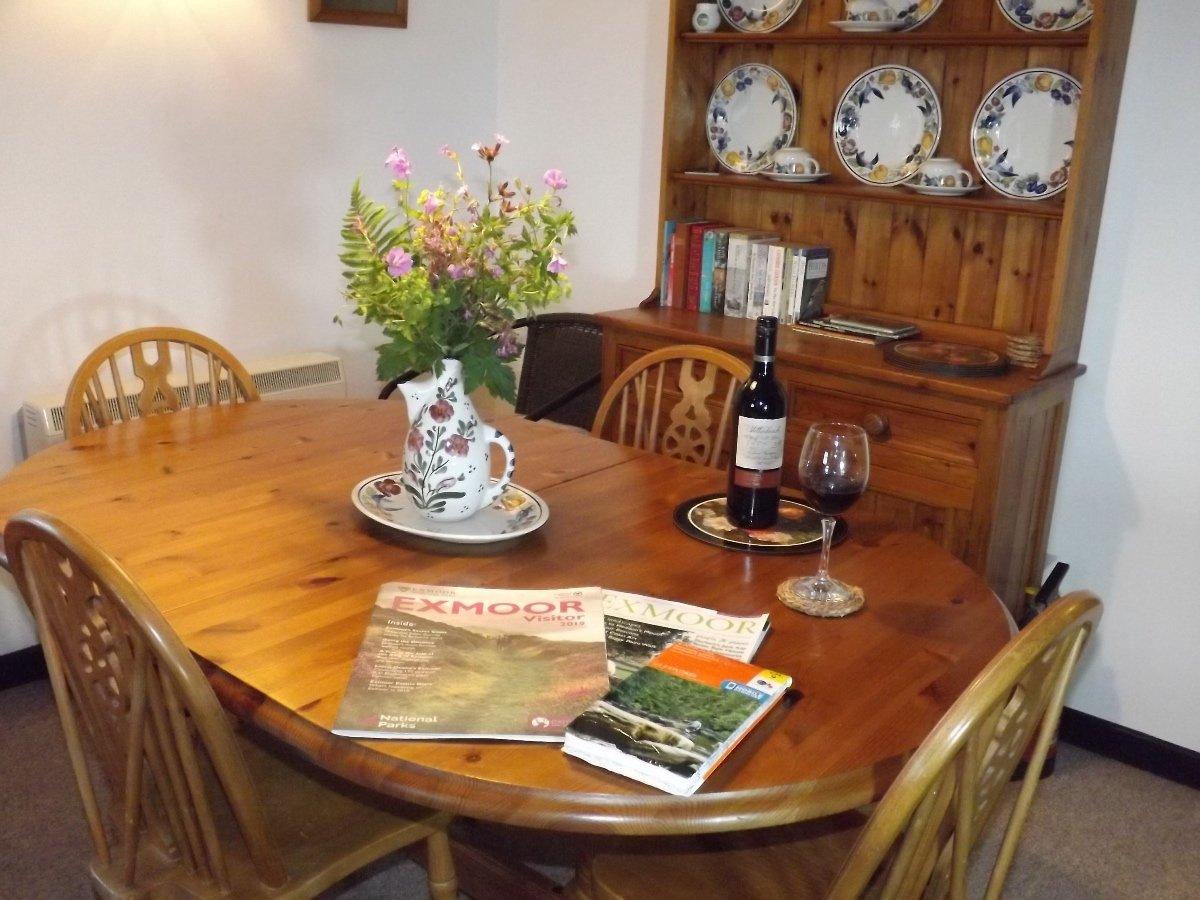 The dining table has a central low level light