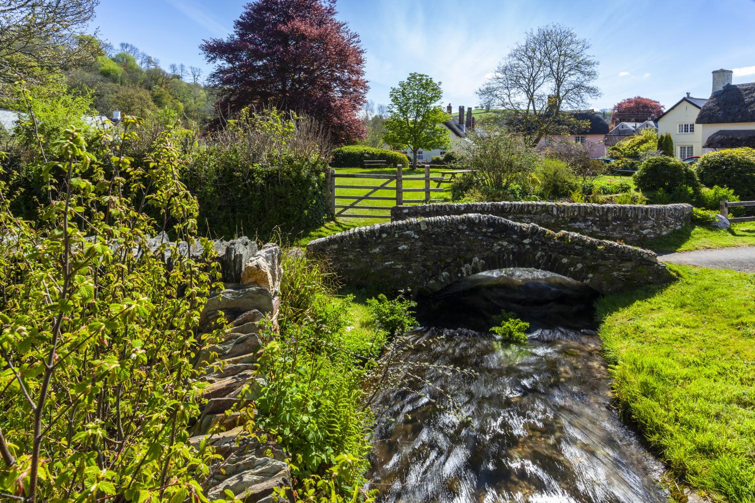 Smithy bridge over the Winn Brook from Dowry Cottage garden Winsford