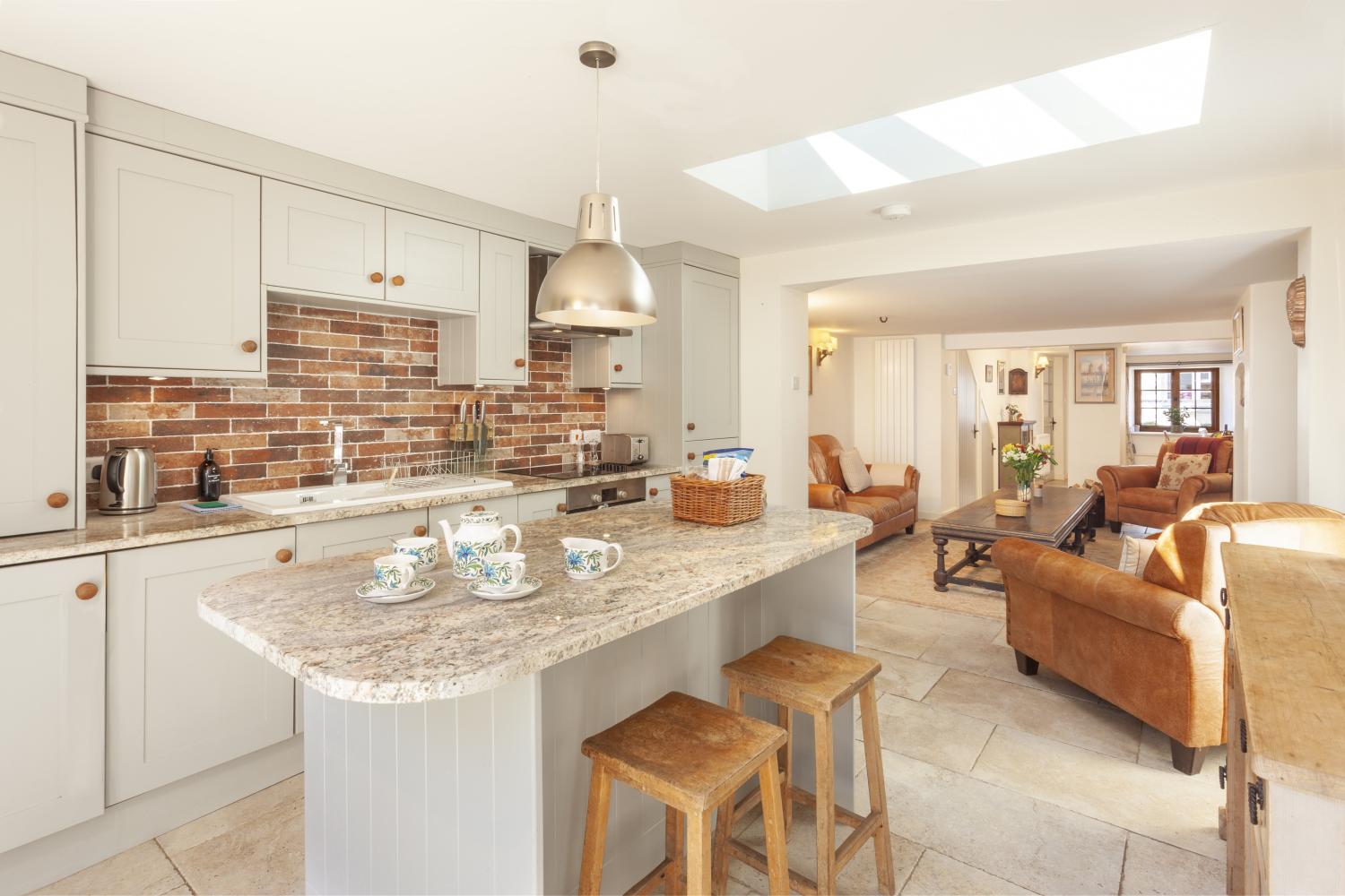 Kitchen breakfast bar area, looking out into the garden