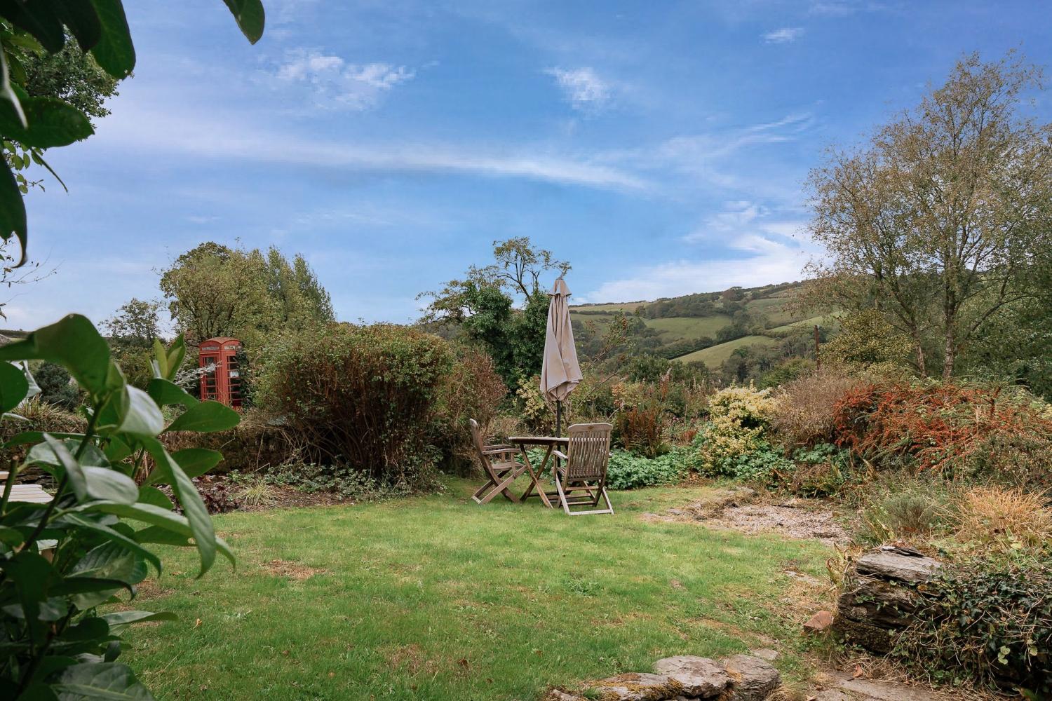 Gloriously sunny enclosed garden with delightful views and SW aspect to enjoy the sun long into the evening