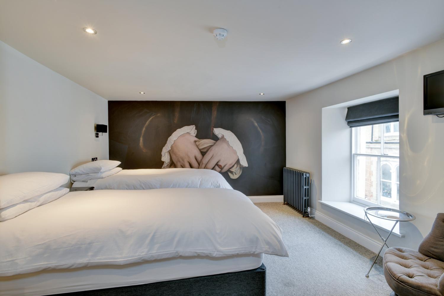 Christina's room. A super king bed or twin upon request when booking. En-suite bath & shower.
