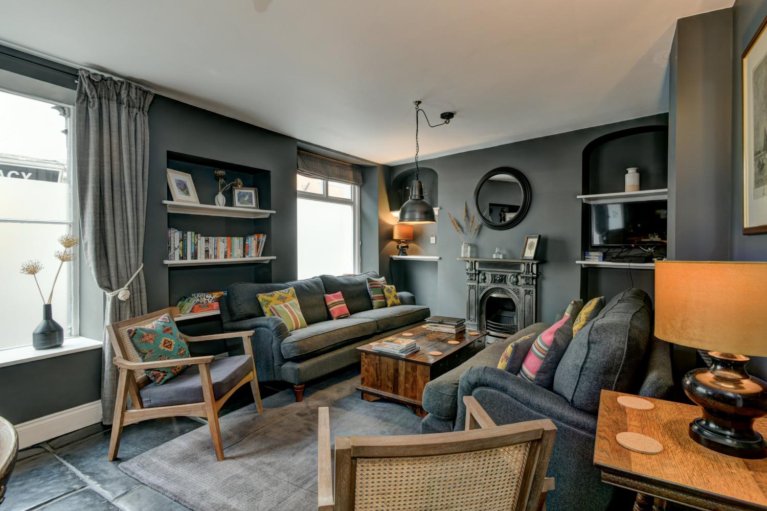 Sitting room area, with 2 x 4 seater sofas and 2 x armchairs