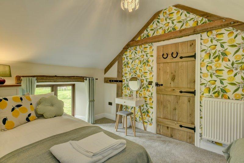 Bedroom 3 has 2 x single beds with a shower room just outside in the landing