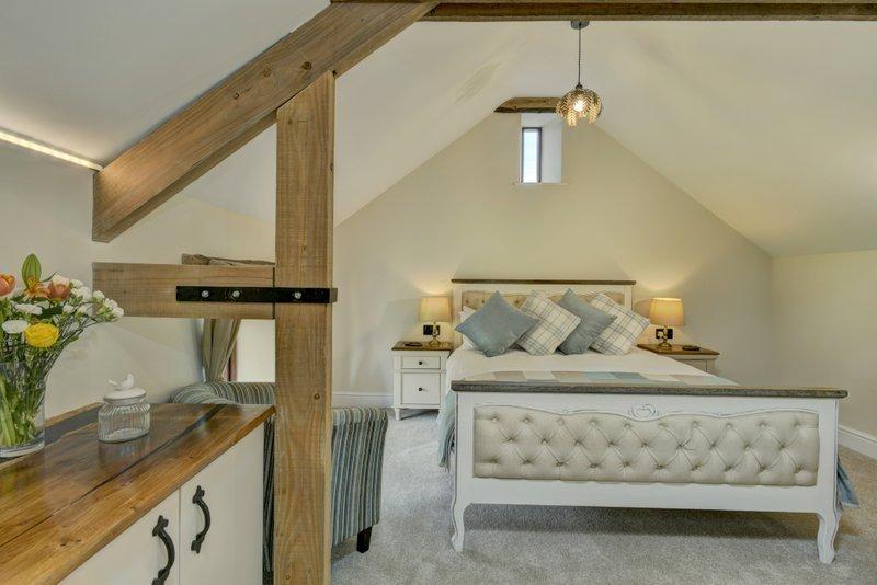 Bedroom 4 has a king sized bed and en-suite bathroom with separate shower [wet room]