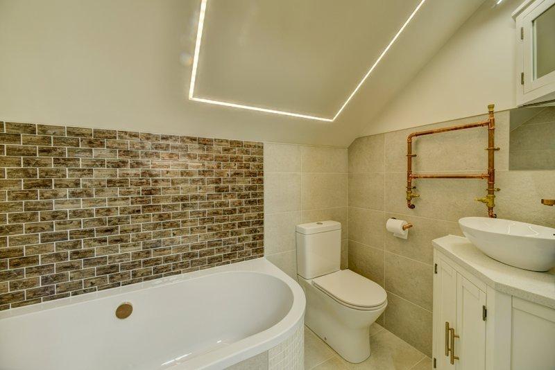 En-suite for bedroom 4. Bath with separate wetroom shower