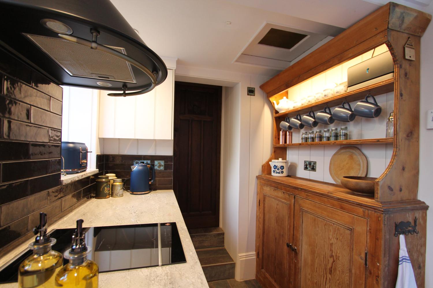 The kitchen looking towards the bathroom